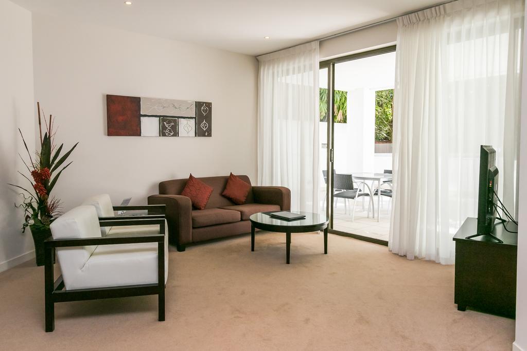 Grand Mercure Allegra Χέρβεϊ Μπέι Εξωτερικό φωτογραφία A living room